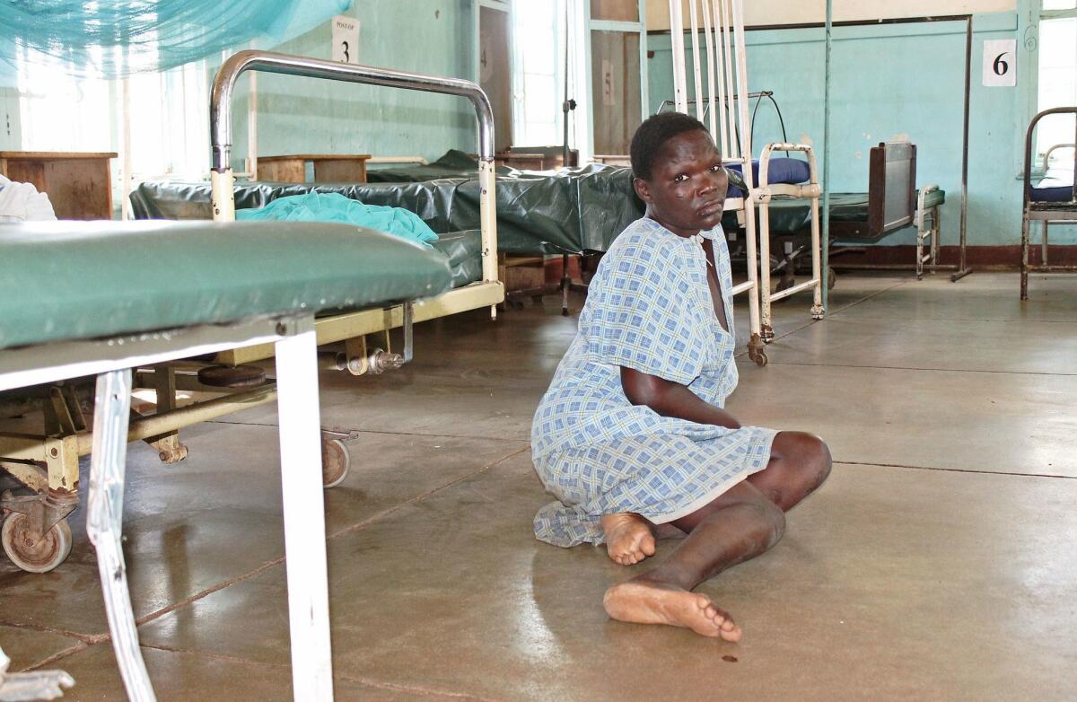 A lone patient in a hospital without doctors in Kisumu County Hospital, Kenya, shortly after the strike began in December.