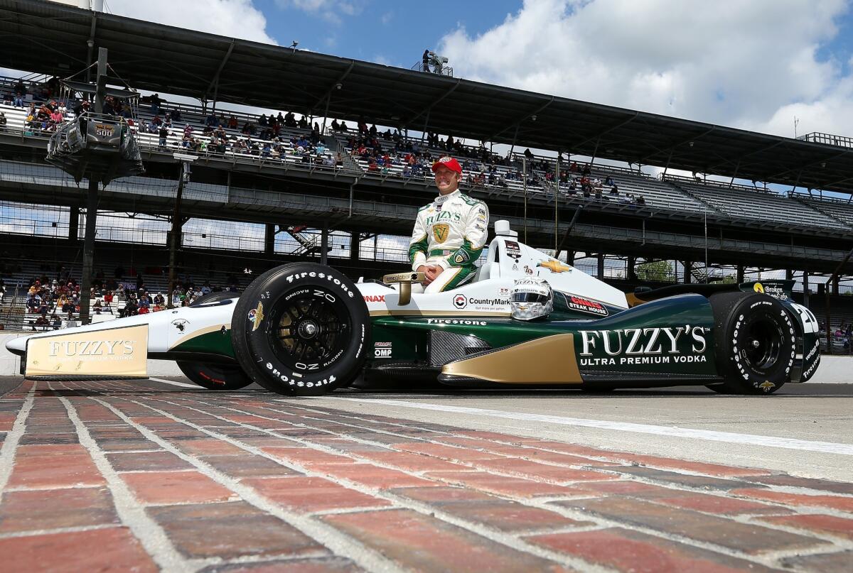 Ed Carpenter finished first in Saturday's Indianapolis 500 qualifier with a four-lap average of 230.661 mph.
