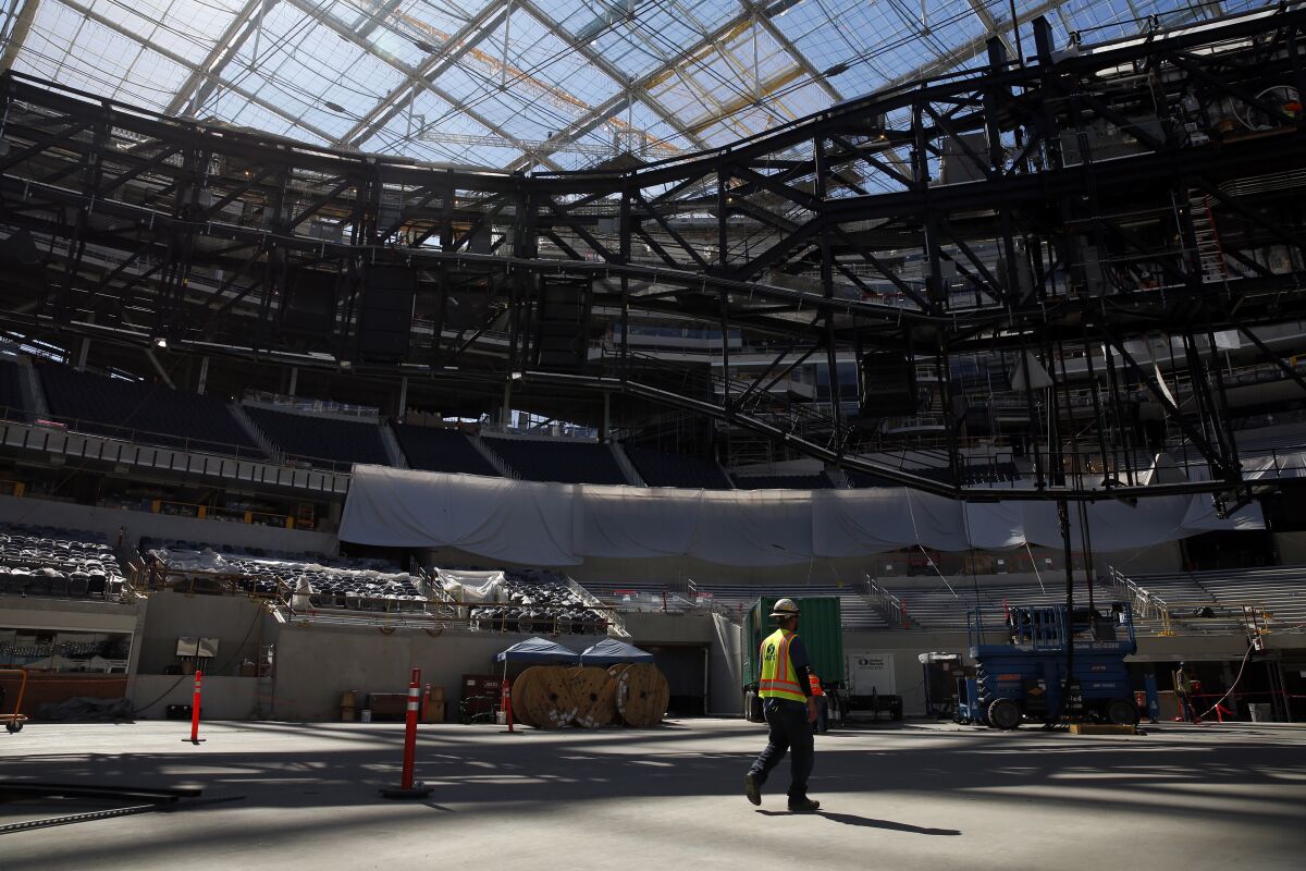 Construction work goes on at SoFi Stadium in Inglewood on Feb. 26.