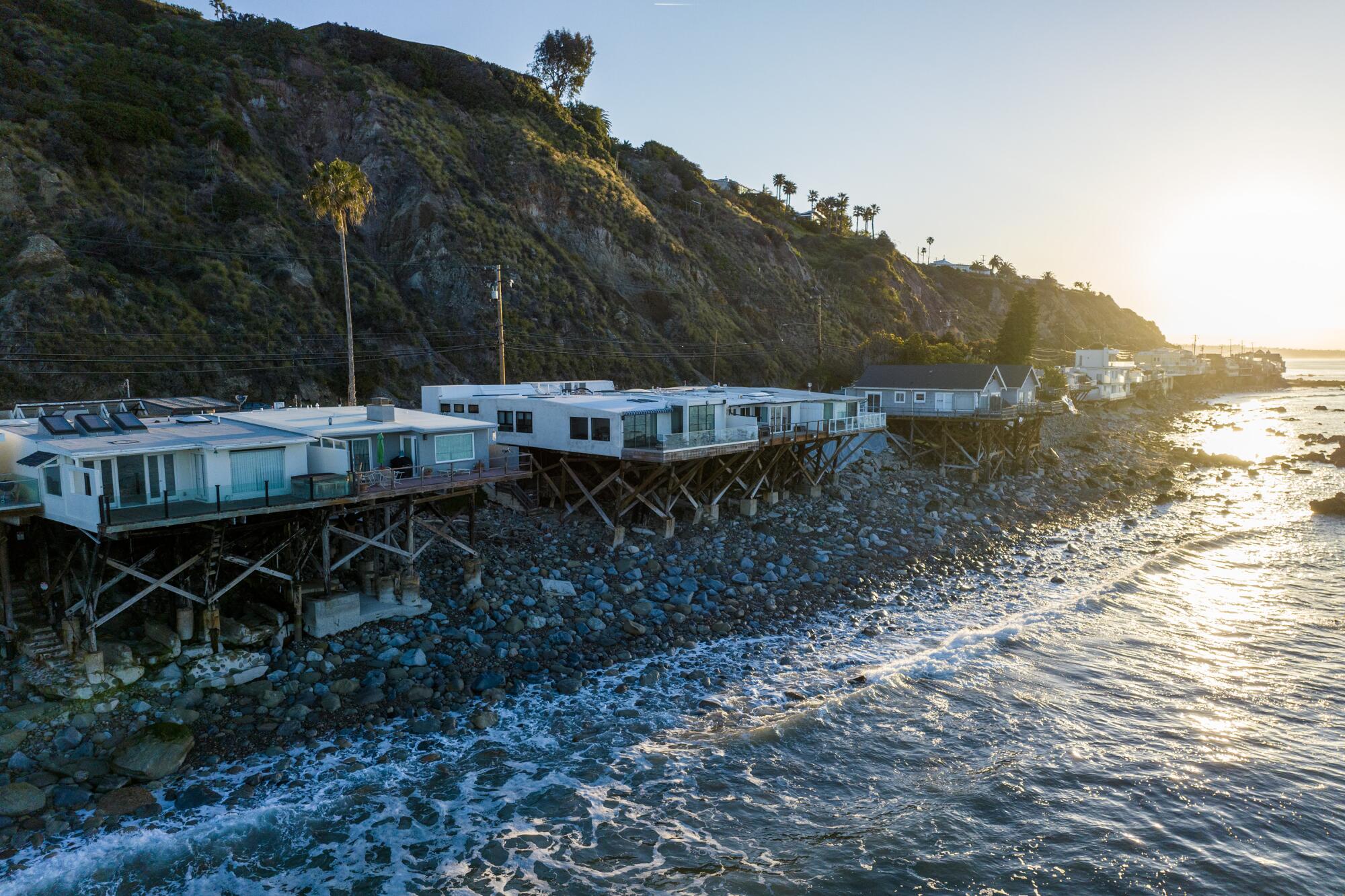 Mark Sawusch's Malibu oceanfront home, left.
