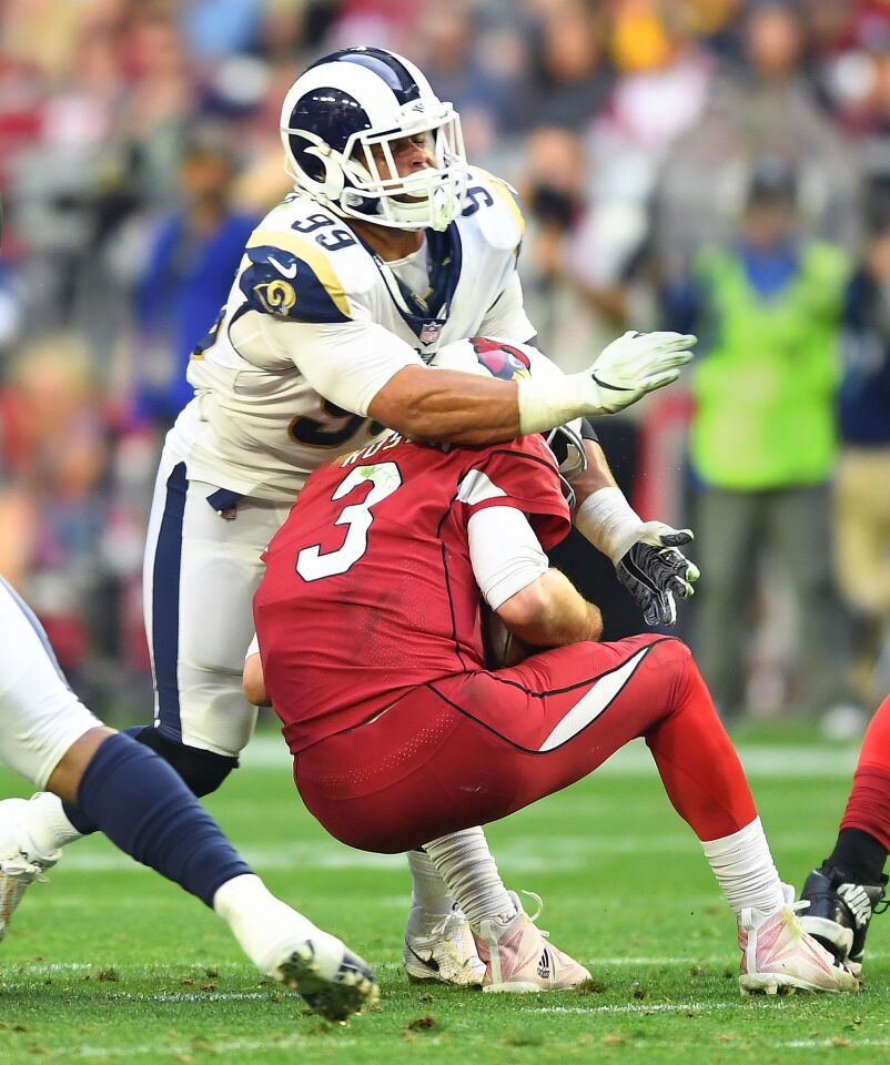 Rams defensive tackle Aaron Donald sacks Arizona Cardinals quarterback Josh Rosen for the third time in the game at State Farm Stadium on Sunday.