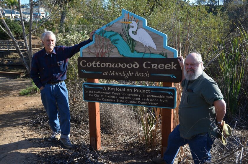 Brad Roth, Cottonwood Creek Conservancy’s project manager, and longtime volunteer Mark Wisniewski (right) pose at the creek. After hosting its first volunteer effort 22 years ago, the group has transformed the area.