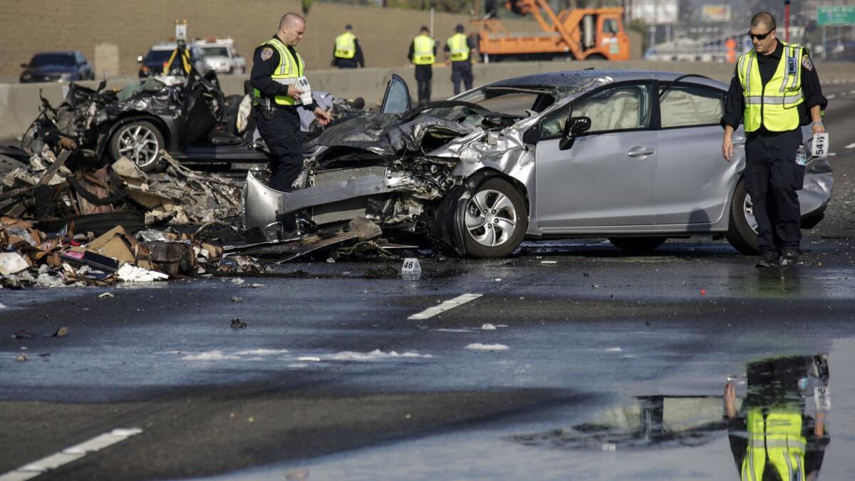 CHP investigators suspect street racing was to blame in a fiery crash on the 5 Freeway that killed three people in City of Commerce in 2016.