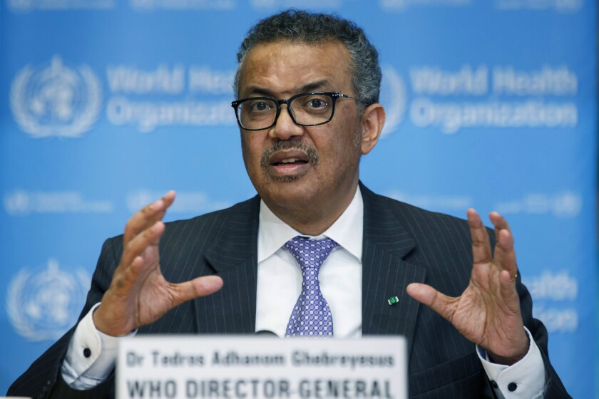 FILE - In this Monday, March 9, 2020 file photo, Tedros Adhanom Ghebreyesus, Director General of the World Health Organization speaks during a news conference, at the WHO headquarters in Geneva, Switzerland. Ghebreyesus says that he is “disappointed” that Chinese officials haven't finalized permissions for the arrival of a team of experts into China to examine origins of COVID-19. In a rare critique of Beijing, he said on Tuesday, Jan. 5, 2021 members of the international scientific team have begun over the last 24 hours to leave from their home countries to China as part of an arrangement between WHO and the Chinese government. (Salvatore Di Nolfi/Keystone via AP, file)