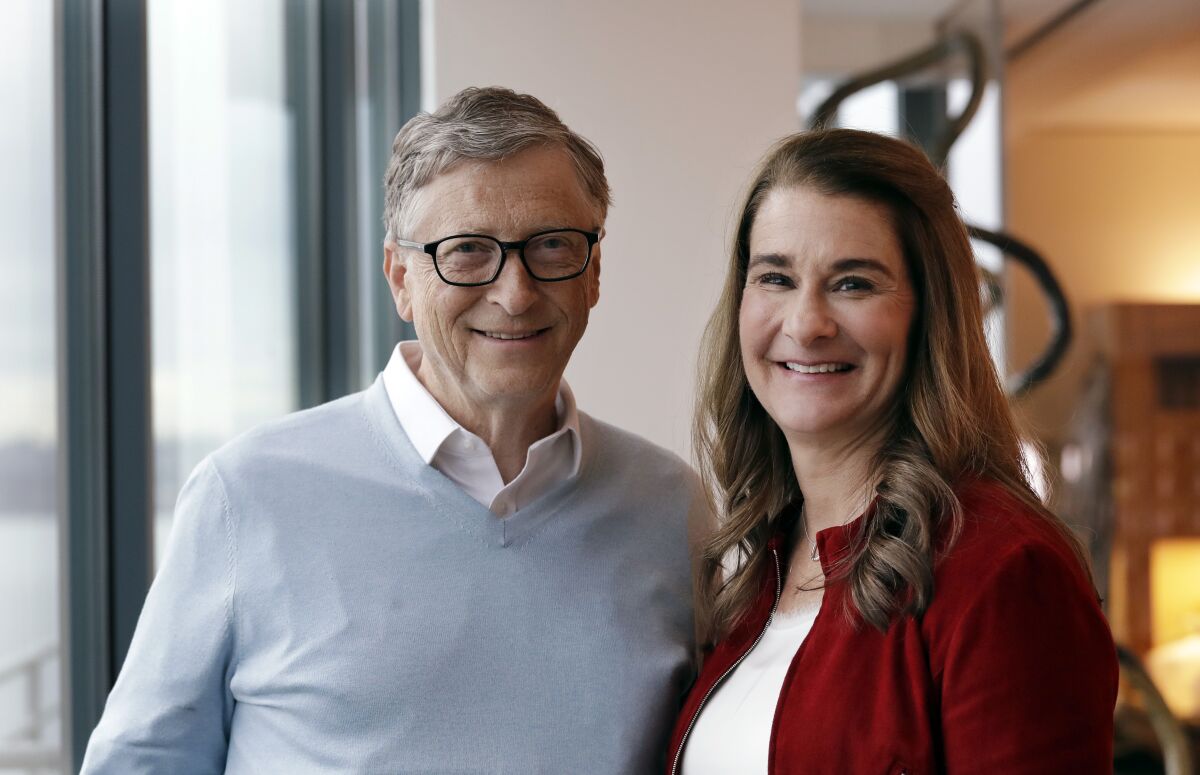 FILE - In this Feb. 1, 2019, file photo, Bill and Melinda French Gates pose together in Kirkland, Wash. The divorce of Bill Gates and Melinda French Gates has been finalized. The Microsoft co-founder and his wife announced in May 2021 they were ending their 27-year marriage and on Monday, Aug. 2, a King County Superior Court judge signed the dissolution decree. (AP Photo/Elaine Thompson, File)