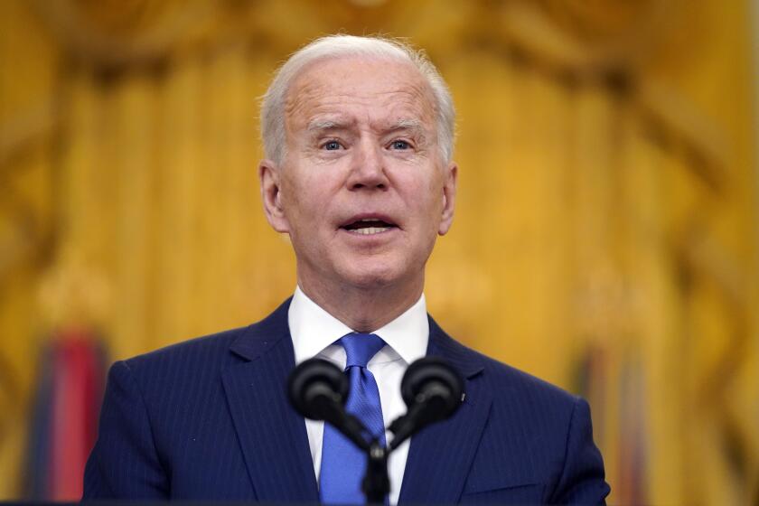 FILE - In this March 8, 2021, file photo, President Joe Biden speaks during an event to mark International Women's Day, Monday, March 8, 2021, in the East Room of the White House in Washington. Biden laid out an ambitious agenda for his first 100 days in office, promising swift action on everything from climate change to immigration reform to the coronavirus pandemic. (AP Photo/Patrick Semansky, File)