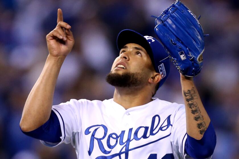 Kansas City Royals pitcher Kelvin Herrera celebrates after recording a strikeout in the seventh inning of a 2-1 win over the Baltimore Orioles in Game 3 of the American League Championship Series on Tuesday.