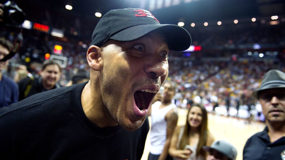LaVar Ball greets fans during halftime at an NBA Summer League game at the Thomas and Mack Center in Las Vegas.