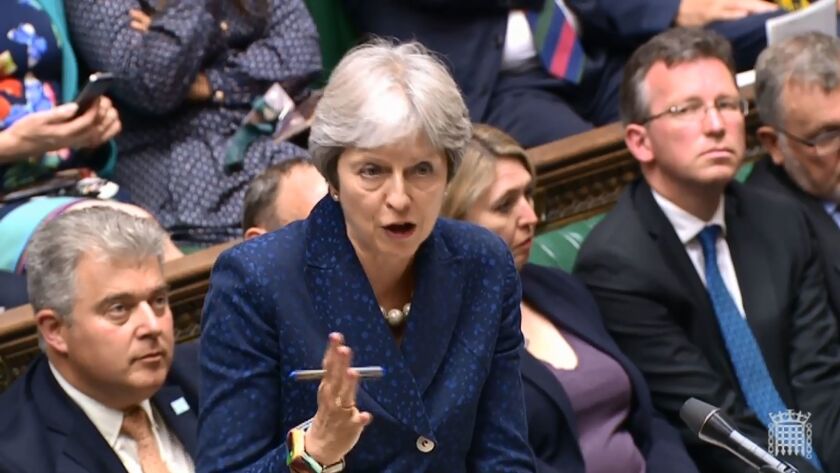 A screen grab from a broadcast shows British Prime Minister Theresa May speaking in the House of Commons on "Brexit" in London on July 9, 2018.