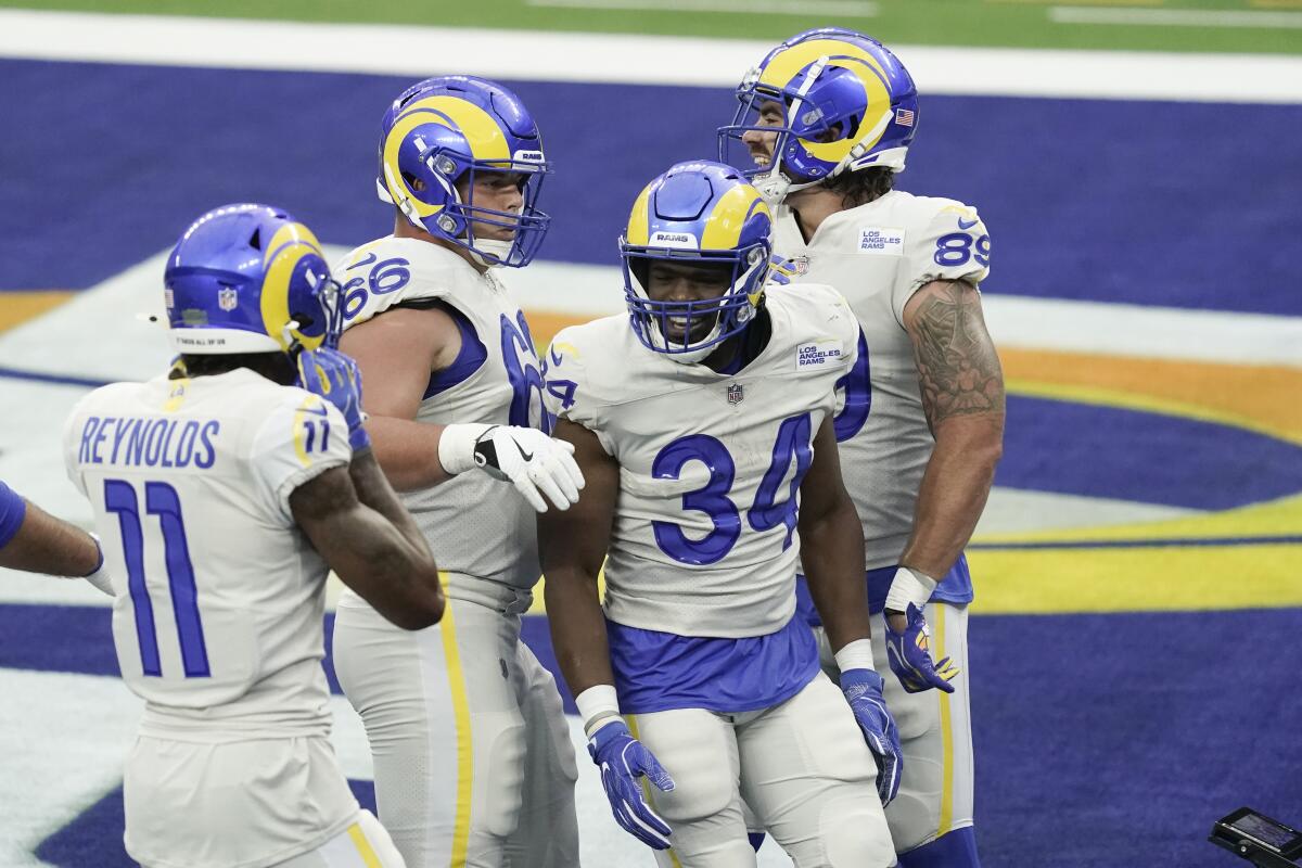 Rams running back Malcolm Brown celebrates after rushing for a touchdown.