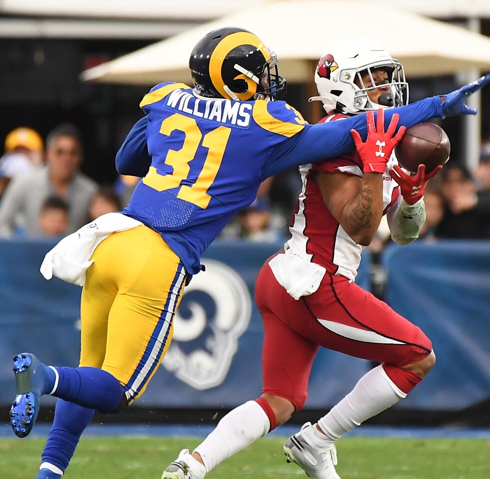 Rams defensive back Darious Williams knocks the ball away from Cardinals receiver Damiere Byrd during the fourth quarter.