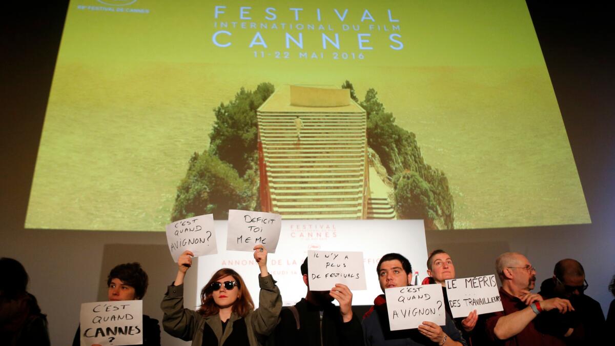 Show business workers stage a protest against labor reforms before the official presentation of the 69th Cannes film festival on April 14.