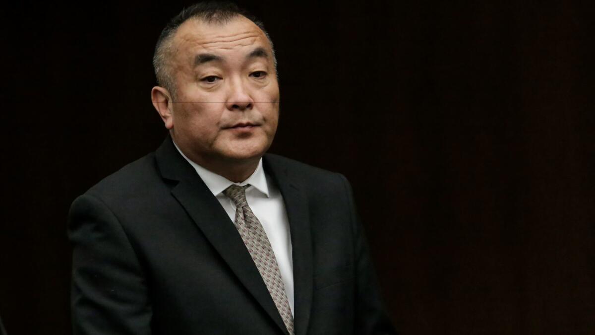 Former Mark Keppel High School girls' basketball coach Joseph Kikuchi appears in court in December 2015. Kikuchi was convicted of 23 counts of sexual abuse of a minor and sentenced to five years in prison.