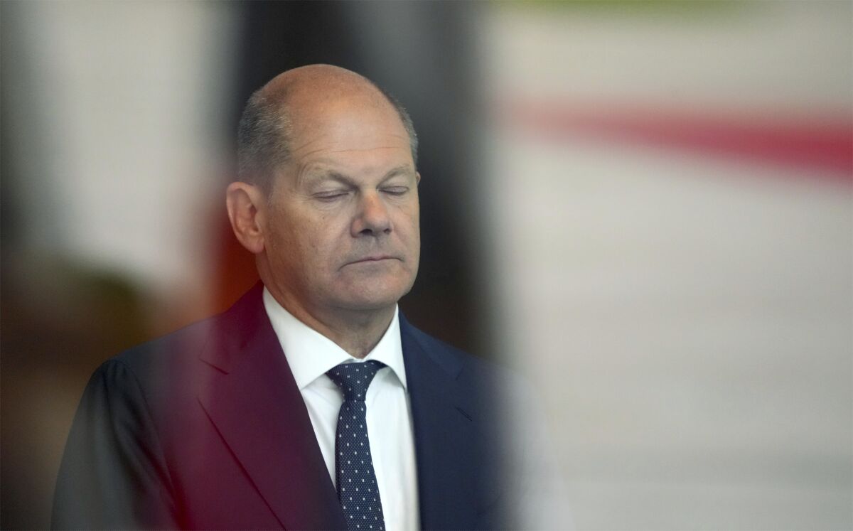 German Chancellor Olaf Scholz waits for the arrival of Slovakia's Prime Minister Eduard Heger for a meeting at the chancellery in Berlin, Germany, Monday, June 13, 2022. (AP Photo/Michael Sohn)