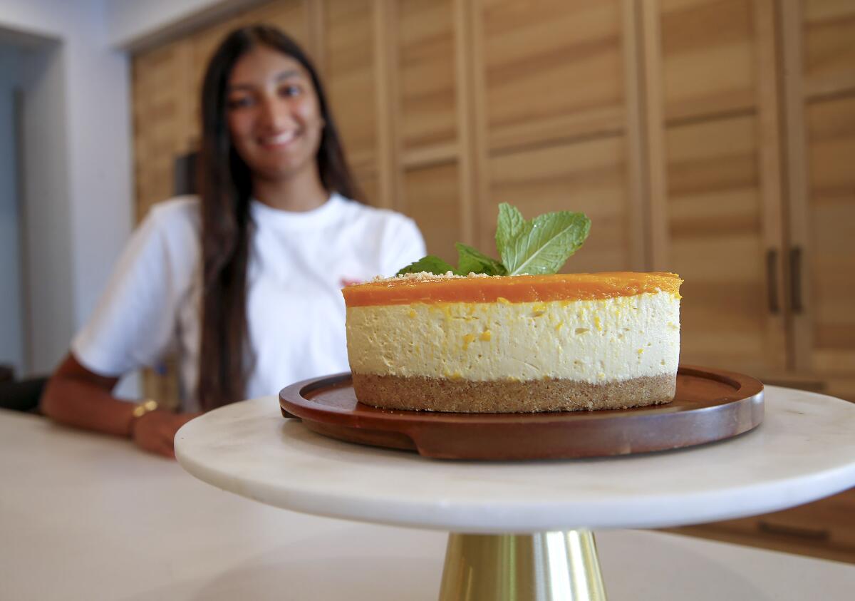 Sage Hill senior Shiksha Anand with her popular mango cheesecake.