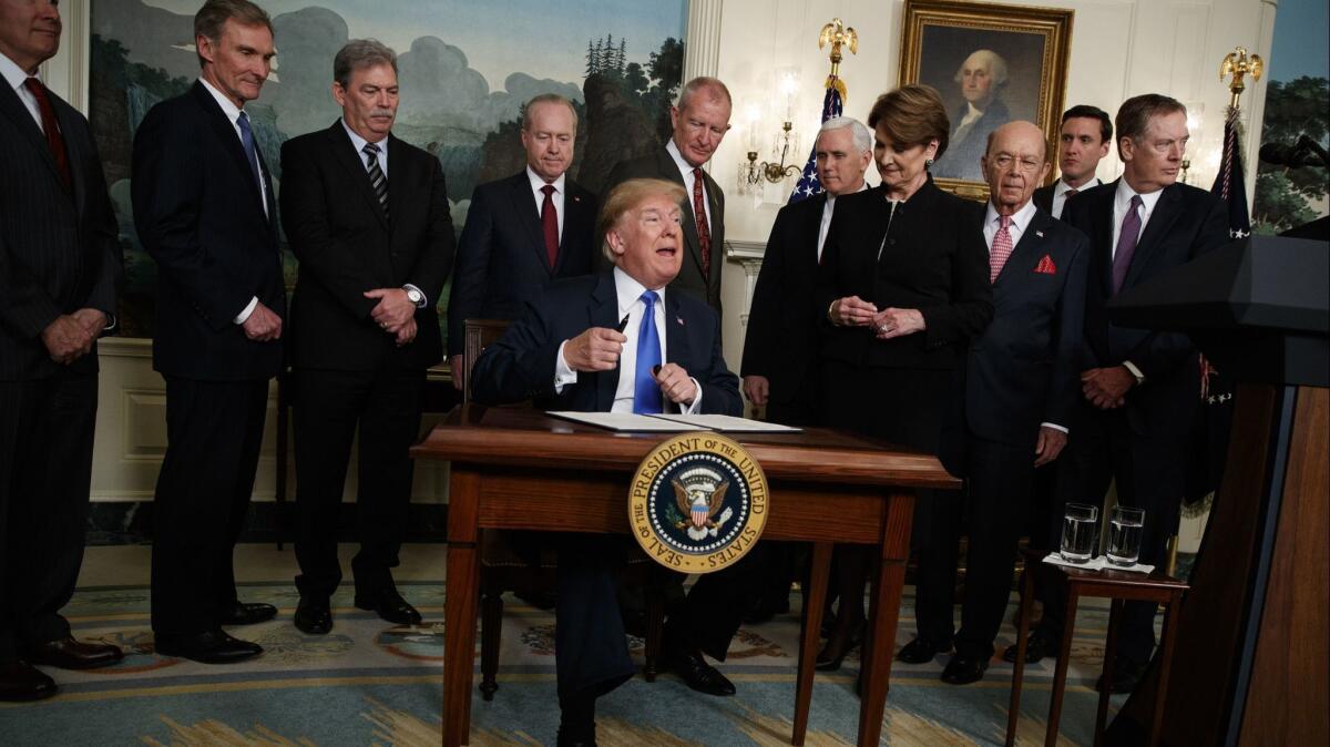 President Donald Trump speaks before signing a Presidential Memorandum imposing tariffs and investment restrictions on China, in the White House, on March 22.