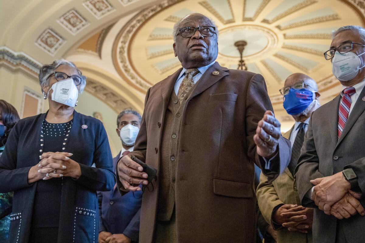 Members of the Congressional Black Caucus speak in at the Capitol.