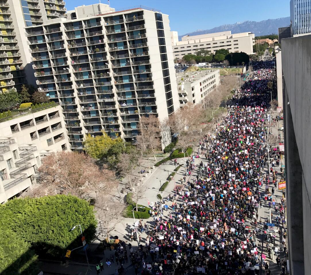 The view looking north along Hill Street from a vantage point near Third Street shows thousands of women's march participants.