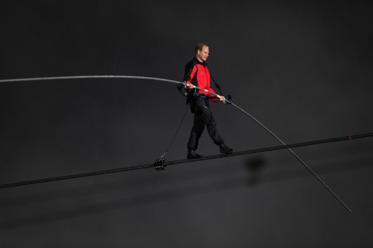 Nik Wallenda makes his historic walk on a wire across Niagara Falls in 2012.