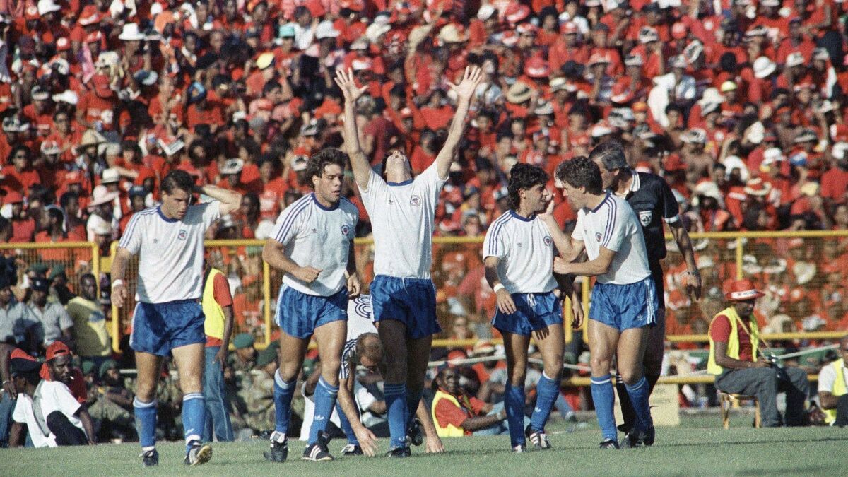 U.S. national team players (left to right) John Harkes, Paul Caligiuri, Bruce Murphy, Tab Ramos and Peter Vermes react following Caligiuri's goal in the historic 1-0 World Cup qualifier at Trinidad and Tobago in 1989.