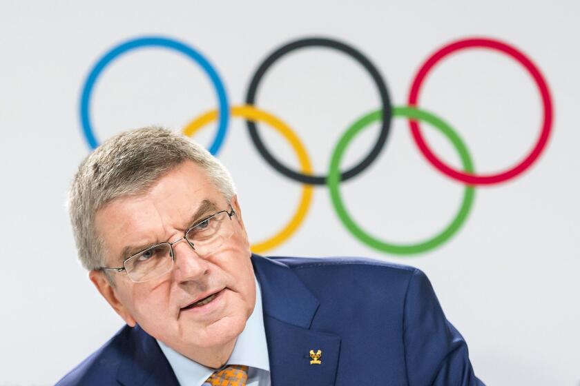 Mandatory Credit: Photo by JEAN-CHRISTOPHE BOTT/EPA-EFE/REX (10322097a) International Olympic Committee (IOC) president Thomas Bach of Germany speaks during a press conference at the 134th Session of the IOC at the SwissTech Convention Centre in Lausanne, Switzerland, 26 June 2019. IOC Session in Lausanne, Switzerland - 26 Jun 2019 ** Usable by LA, CT and MoD ONLY **