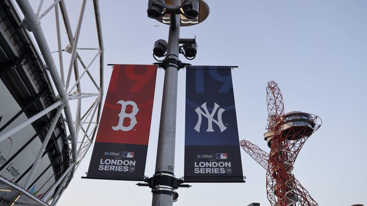 Banners outside London Stadium in Queen Elizabeth Olympic Park announce the London series between the Yankees and Red Sox.