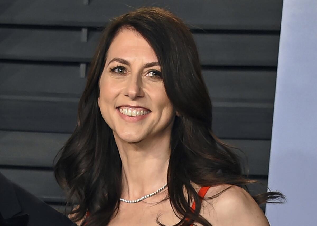 FILE - Then-MacKenzie Bezos arrives at the Vanity Fair Oscar Party on March 4, 2018, in Beverly Hills, Calif. The megadonor and novelist announced almost $2 billion in donations to 343 organizations in a short blog post Monday, Nov, 14, 2022, emphasizing her interest in supporting people from underserved communities. (Photo by Evan Agostini/Invision/AP, File)