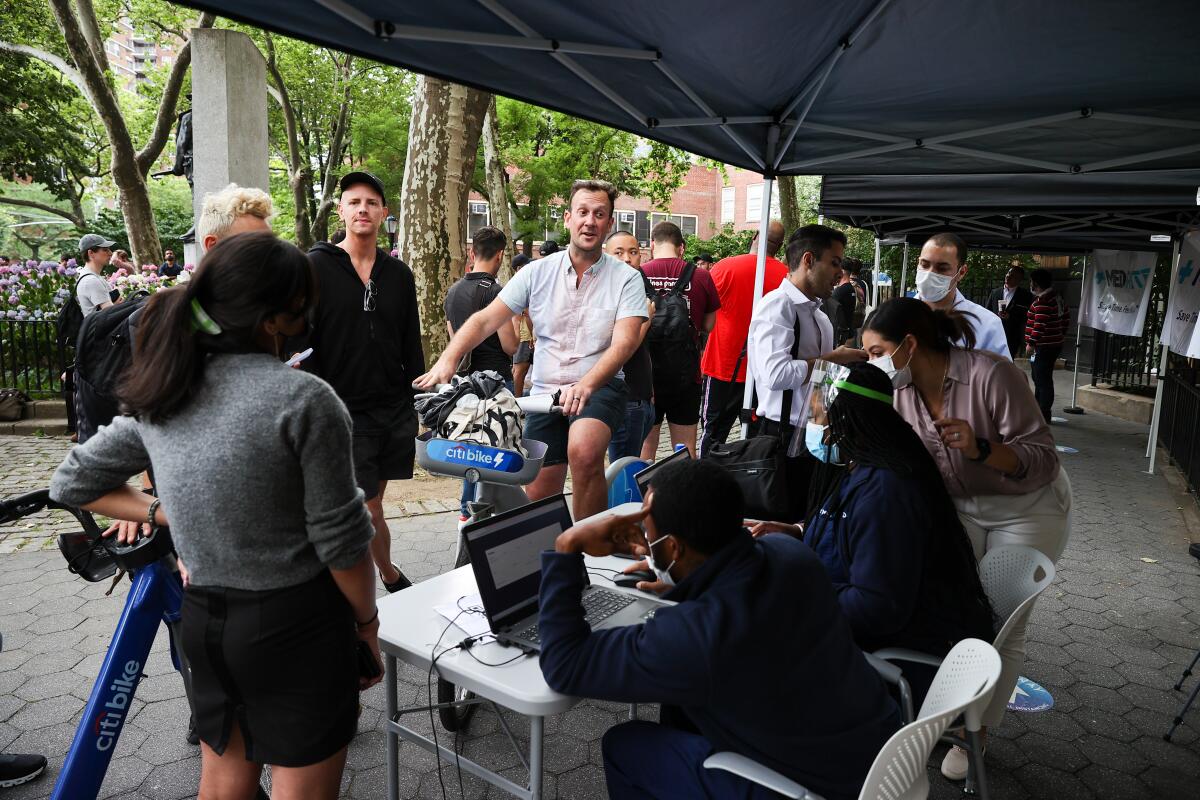 Residents line up for vaccines.