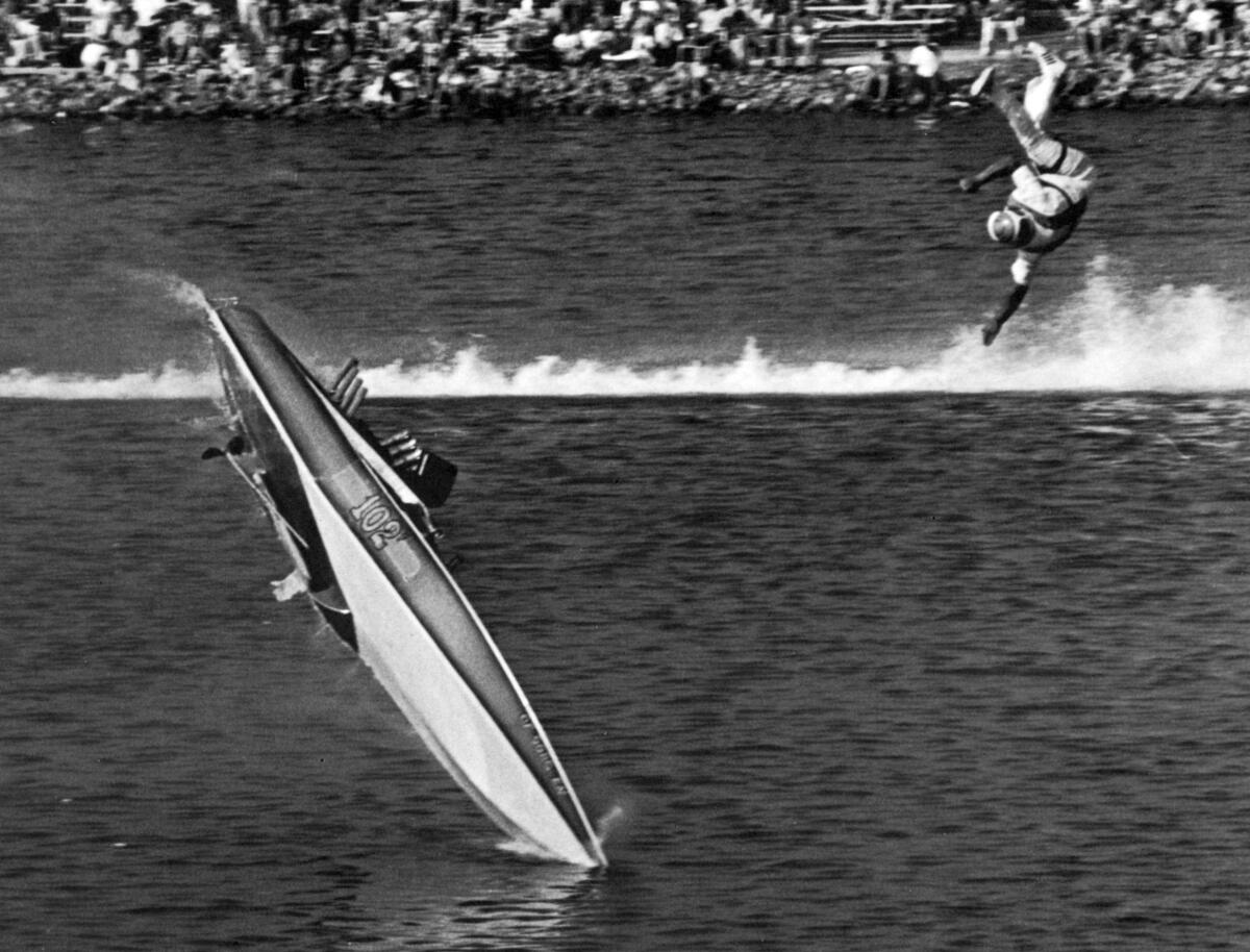 Aug. 15, 1971: Pilot Sonny DiMarco of Sun Valley is thrown into the air as his boat flips wildly in a finish-line crash at the National Drag Boat Assn. Races at Long Beach Marine Stadium. This photo appeared in the Aug. 16, 1971, Los Angeles Times.