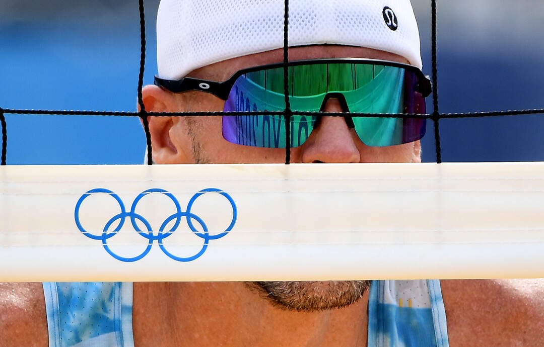 USA's Tri Bourne waits for the serve during a match against Switzerland.