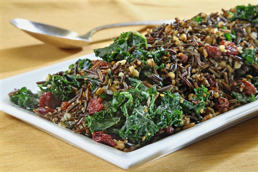 Kale and wild rice salad with raisins and walnuts