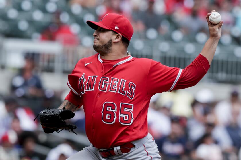 Los Angeles Angels' Jose Quijada pitches against the Atlanta Braves during the seventh inning.