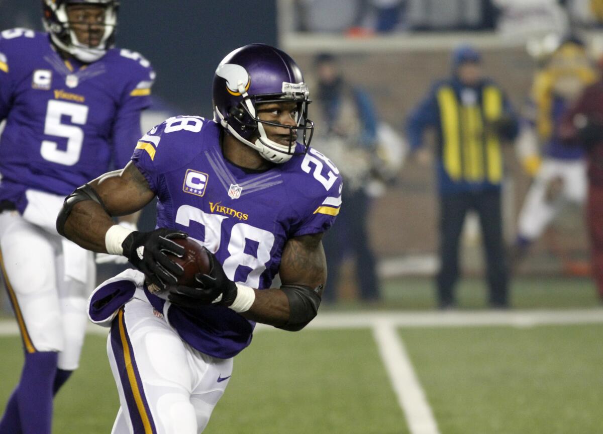 Vikings running back Adrian Peterson (28) ran for 104 yards and a touchdown in a win over the Giants.