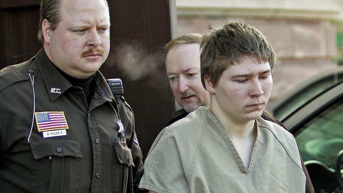 Brendan Dassey, is escorted out of a Manitowoc County Circuit courtroom in 2006.