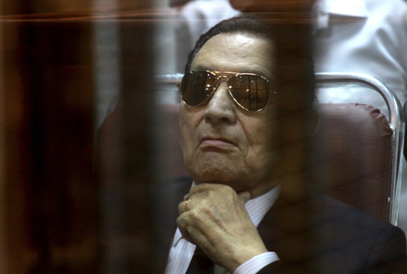 Ousted Egyptian president Hosni Mubarak listens during an April 26 trial hearing.