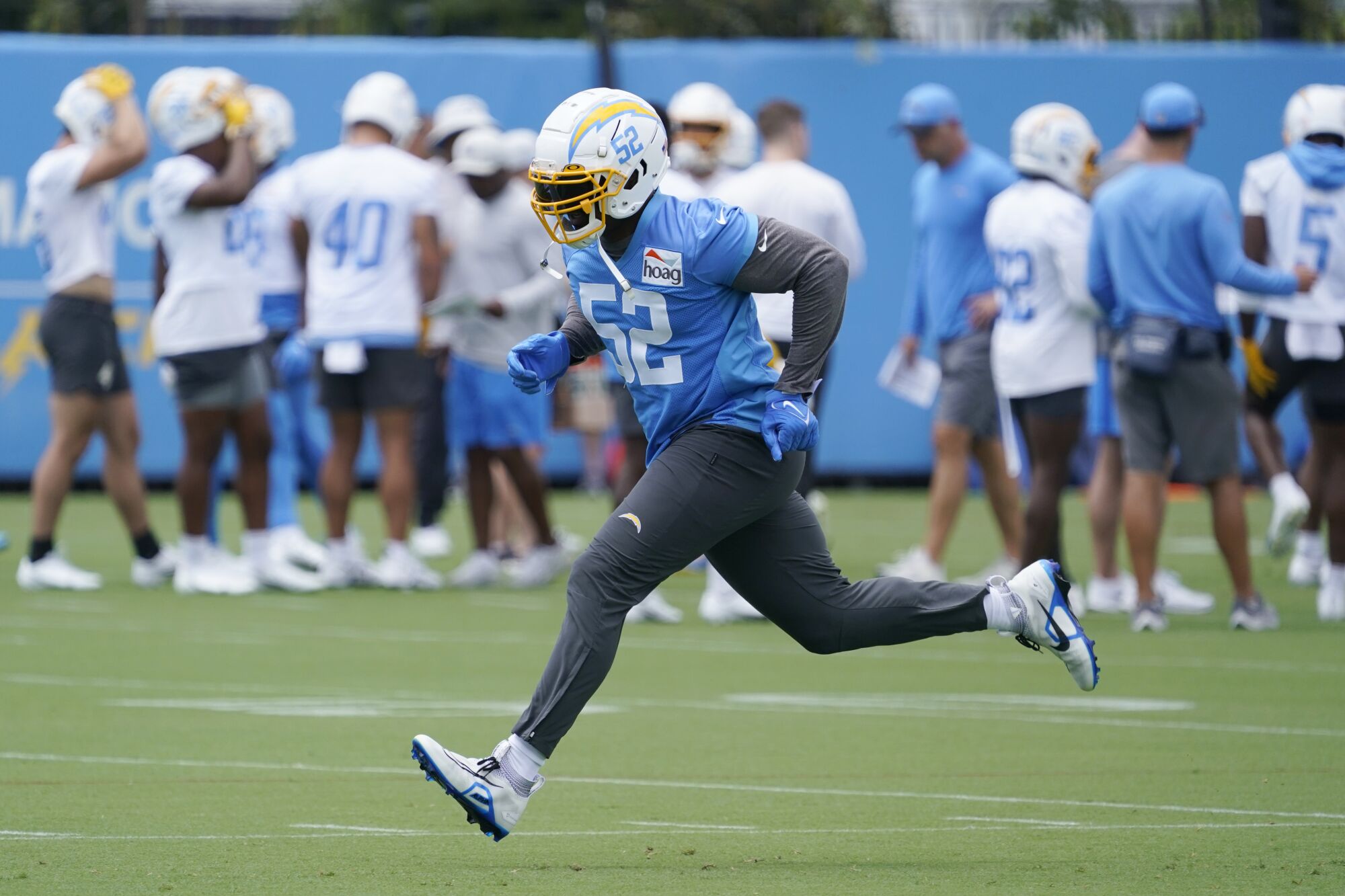 Chargers linebacker Khalil Mack runs drills at the team's practice facility in Costa Mesa on June 14.