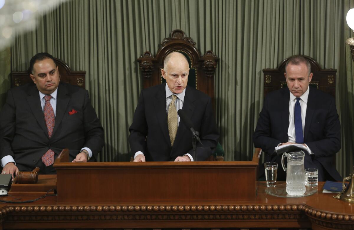 Gov. Jerry Brown gives his State of the State address in January flanked by Assembly Speaker John Perez (D-Los Angeles), left, and Senate President Pro Tem Darrell Steinberg (D-Sacramento). All three reported Saturday that they accepted gifts last year.
