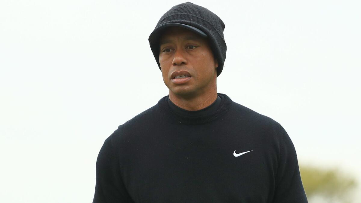 Tiger Woods looks on during a PGA Championship practice round Tuesday in Farmingdale, N.Y.
