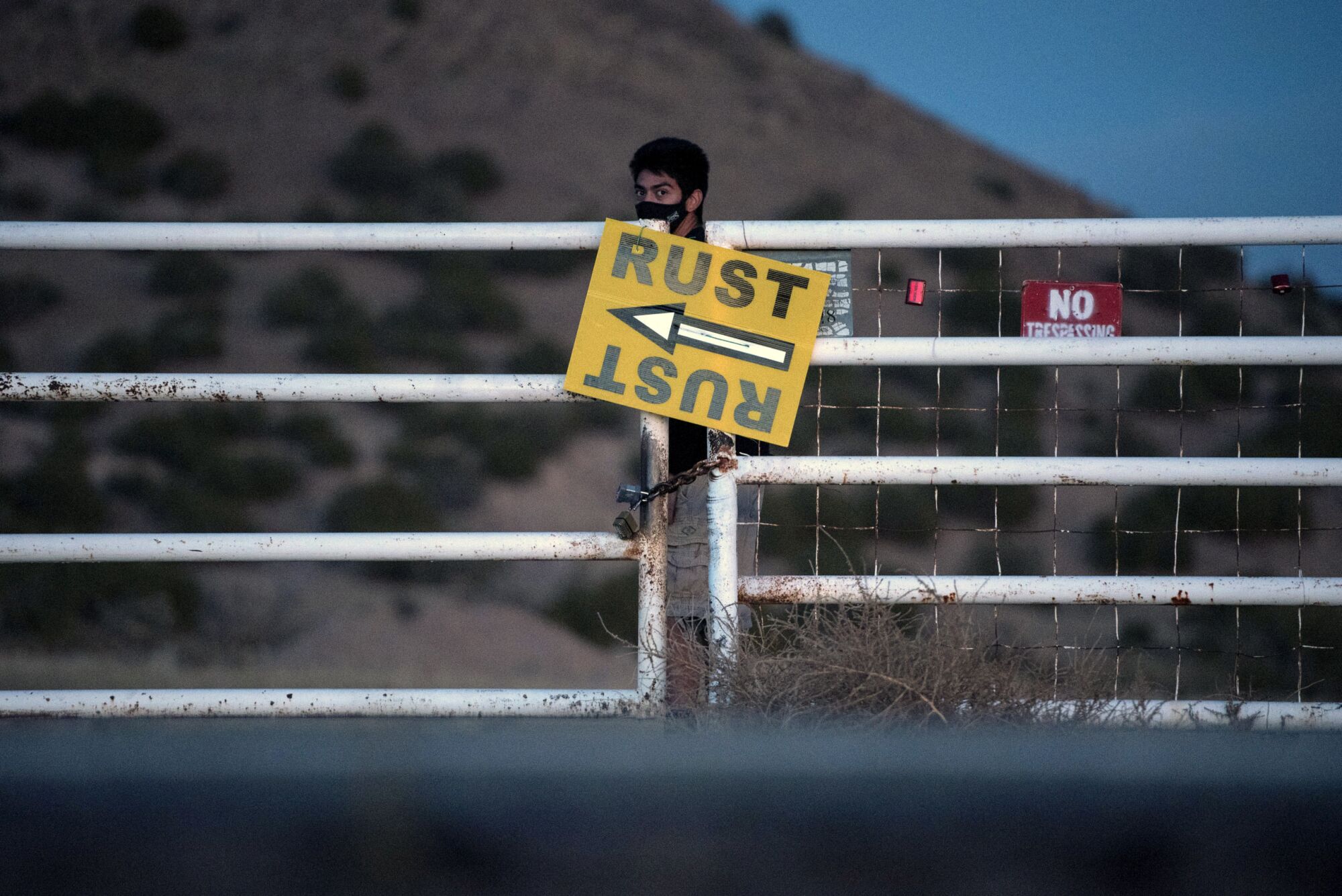 A security guard blocks a gate at Bonanza Creek Ranch on  Oct. 21.