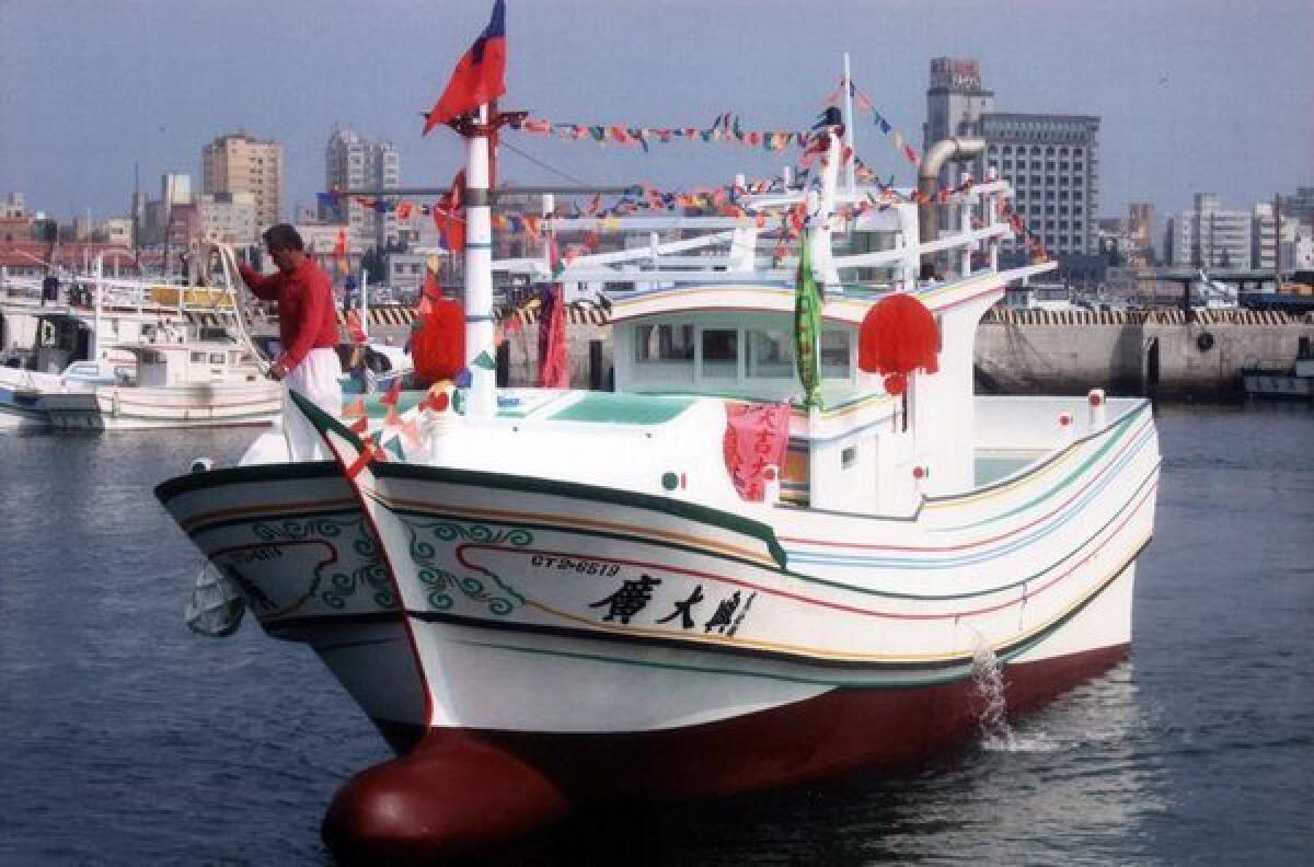 The Liuqiu Fishermen's Assn. released this undated photograph said to show the Taiwanese boat in which a fisherman was shot and killed Thursday in disputed waters.