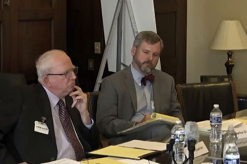 In this image from video released by the House Select Committee, John Eastman, a lawyer for former President Donald Trump, appears during a video deposition to the House select committee investigating the Jan. 6 attack on the U.S. Capitol at the hearing June 16, 2022, on Capitol Hill in Washington. Eastman says in a federal court filing that FBI agents have seized his cell phone. (House Select Committee via AP)