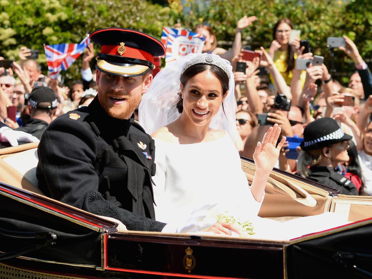 Prince Harry and Meghan, duchess of Sussex, leave Windsor Castle after their wedding.
