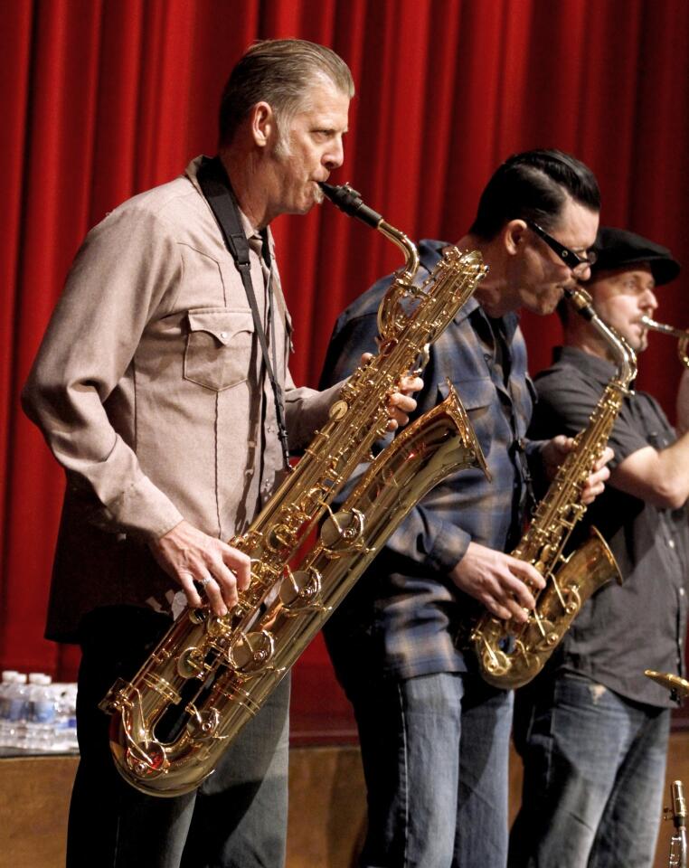 Photo Gallery: Big Bad Voodoo Daddy horns teach local students music