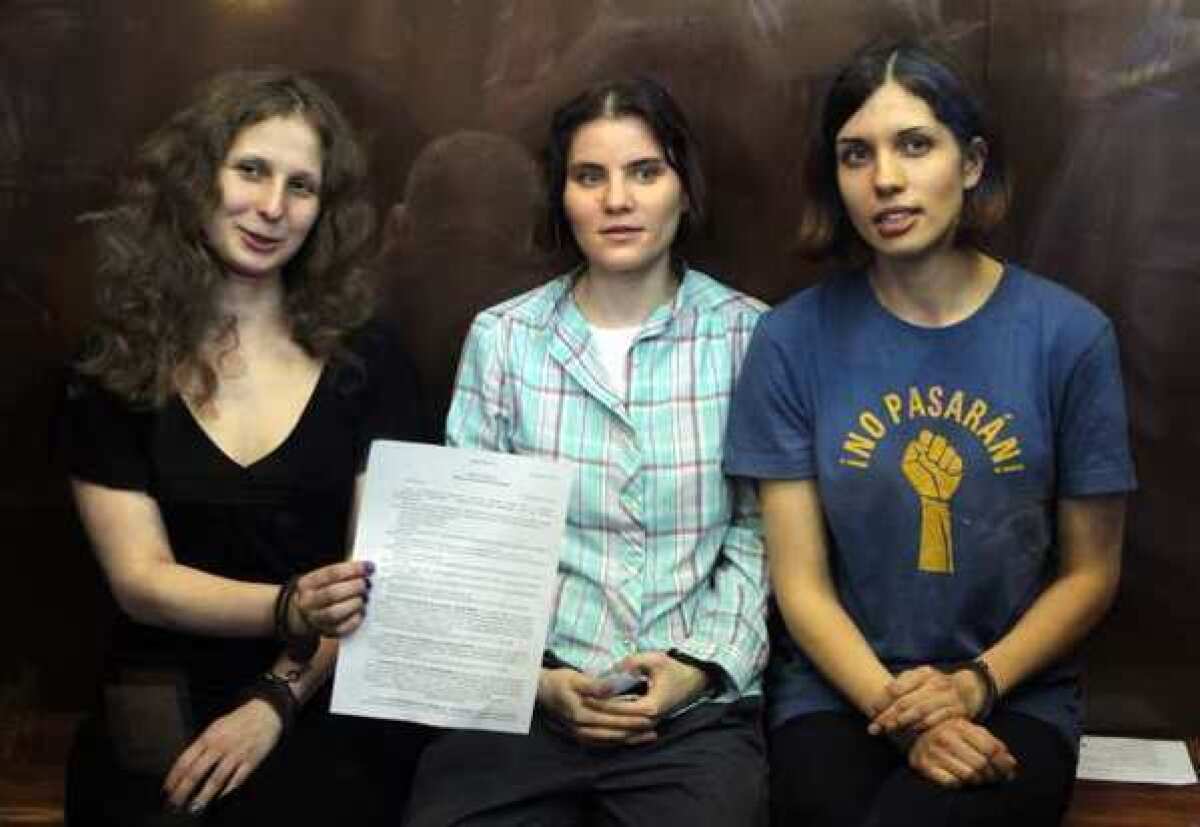 Pussy Riot members Maria Alekhina, Yekaterina Samutsevich and Nadezhda Tolokonnikova, in a Russian courtroom.