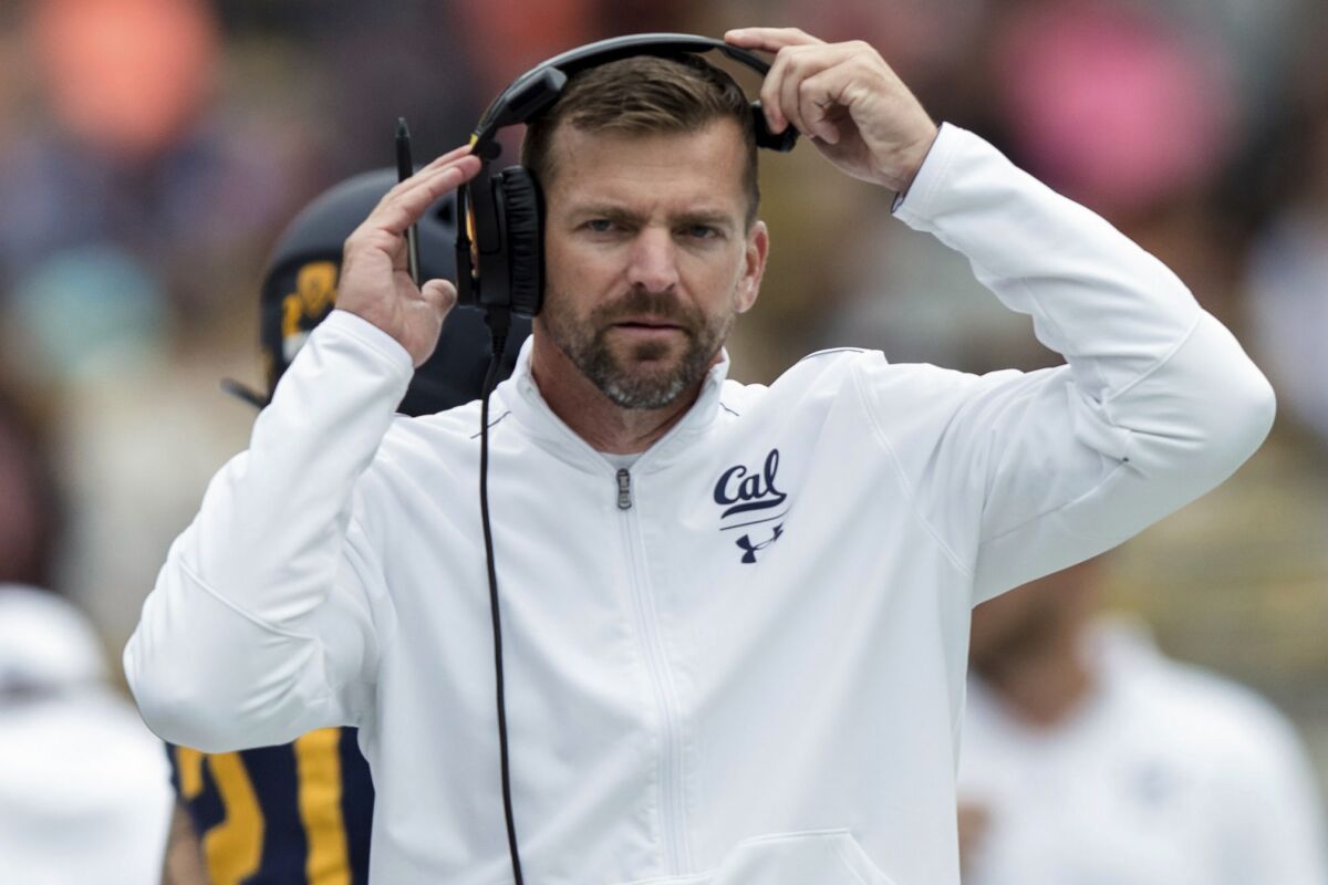 FILE - In this Oct. 19, 2019, file photo, California Golden head coach Justin Wilcox watches during the fourth quarter of an NCAA college football game against the Oregon State in Berkeley, Calif. The season opener between California and Washington has been canceled following a request from the Golden Bears due to a positive coronavirus test for one of their players.(AP Photo/John Hefti, File)