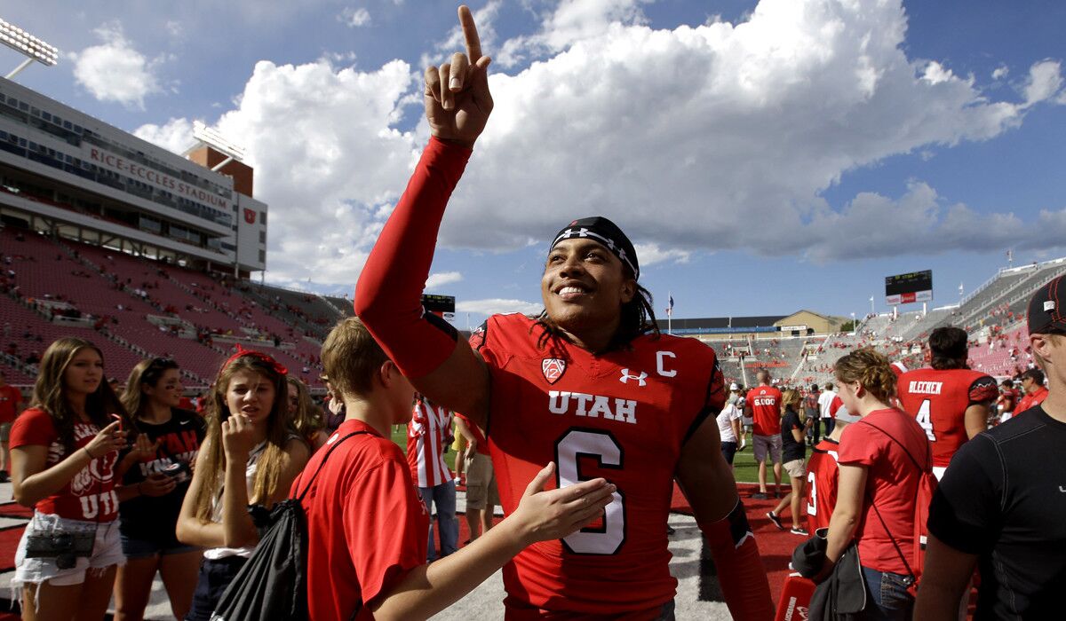 Utah wide receiver Dres Anderson (6) celebrates with fans following a 59-27 victory over Fresno State last month.