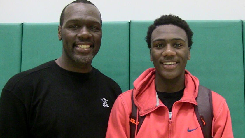 Lafayette Dorsey Sr. (left) poses for a photo with son Lafayette Jr. Both were basketball standouts in the City Section.