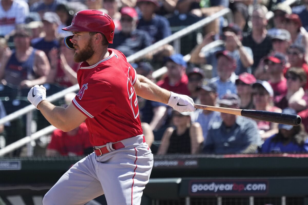 The Angels' Jared Walsh swings against Cleveland during a spring training game March 14, 2023, in Goodyear, Ariz.