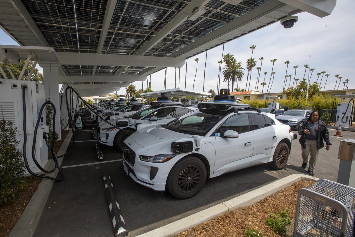 A row of charging cars.