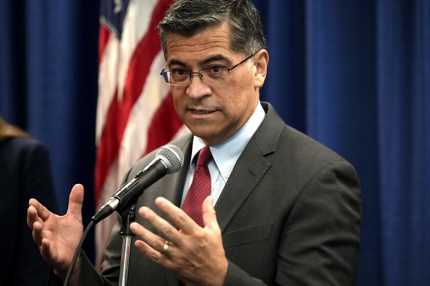 California Attorney General Xavier Becerra gestures while speaking at a media conference Wednesday, Nov. 6, 2019, in San Francisco. Becerra disclosed an ongoing probe into Facebook privacy practices as investigators sought a court's help in getting documents and answers from Facebook. The California probe, one of many legal inquiries into Facebook, began as a response to the Cambridge Analytica scandal and grew into an investigation into whether Facebook has misrepresented its privacy practices, deceived users and broken California law.(AP Photo/Ben Margot)